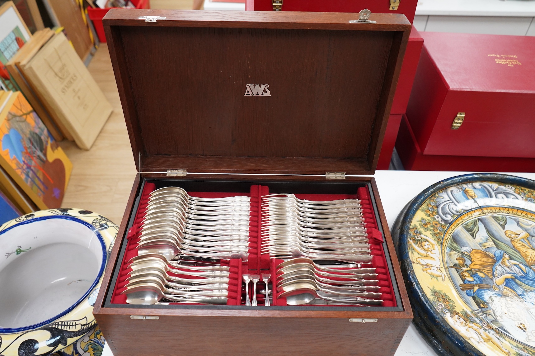 An oak cased, near complete, comprehensive canteen of plated cutlery together with odd cutlery from other sets.